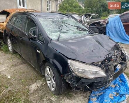 Черный Опель Астра, объемом двигателя 1.7 л и пробегом 180 тыс. км за 2100 $, фото 1 на Automoto.ua