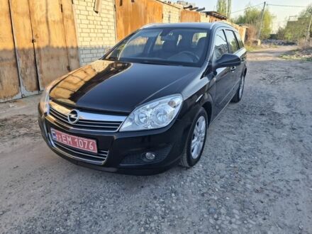 Чорний Опель Астра, об'ємом двигуна 1 л та пробігом 157 тис. км за 6680 $, фото 1 на Automoto.ua