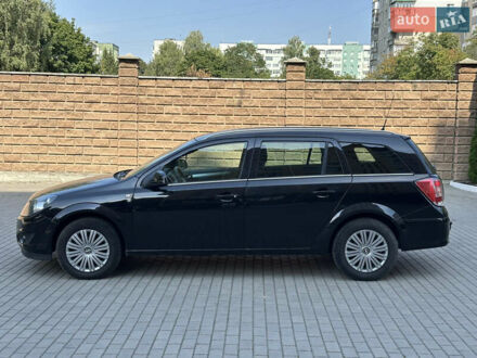 Черный Опель Астра, объемом двигателя 1.6 л и пробегом 265 тыс. км за 5550 $, фото 1 на Automoto.ua