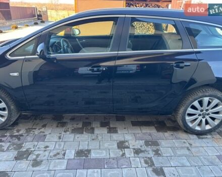 Черный Опель Астра, объемом двигателя 1.4 л и пробегом 218 тыс. км за 6950 $, фото 1 на Automoto.ua