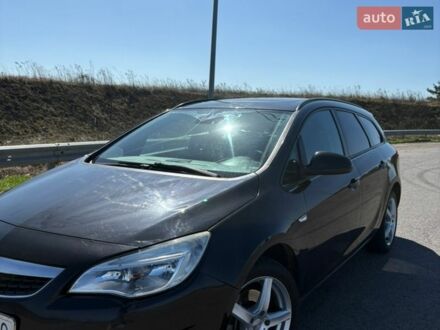 Черный Опель Астра, объемом двигателя 1.7 л и пробегом 398 тыс. км за 5800 $, фото 1 на Automoto.ua