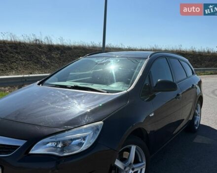 Черный Опель Астра, объемом двигателя 1.7 л и пробегом 398 тыс. км за 5800 $, фото 1 на Automoto.ua