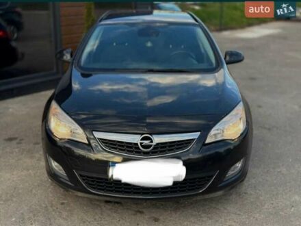 Черный Опель Астра, объемом двигателя 1.4 л и пробегом 253 тыс. км за 6000 $, фото 1 на Automoto.ua