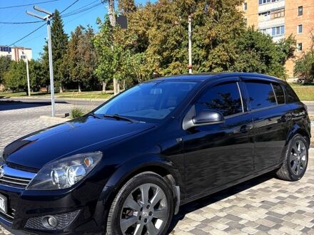 Черный Опель Астра, объемом двигателя 1.6 л и пробегом 220 тыс. км за 5600 $, фото 1 на Automoto.ua