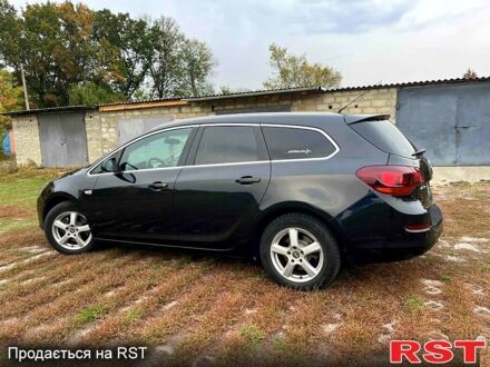 Черный Опель Астра, объемом двигателя 1.7 л и пробегом 215 тыс. км за 5900 $, фото 1 на Automoto.ua