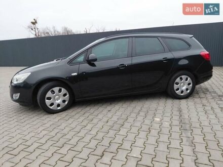 Черный Опель Астра, объемом двигателя 1.25 л и пробегом 1 тыс. км за 6200 $, фото 1 на Automoto.ua
