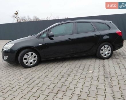 Черный Опель Астра, объемом двигателя 1.25 л и пробегом 1 тыс. км за 6200 $, фото 1 на Automoto.ua
