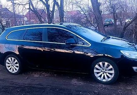 Черный Опель Астра, объемом двигателя 1.2 л и пробегом 250 тыс. км за 6100 $, фото 1 на Automoto.ua