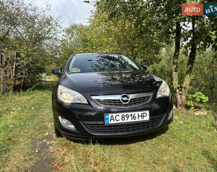 Чорний Опель Астра, об'ємом двигуна 1.25 л та пробігом 243 тис. км за 8150 $, фото 1 на Automoto.ua