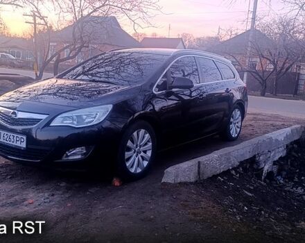 Черный Опель Астра, объемом двигателя 1.2 л и пробегом 250 тыс. км за 6100 $, фото 1 на Automoto.ua