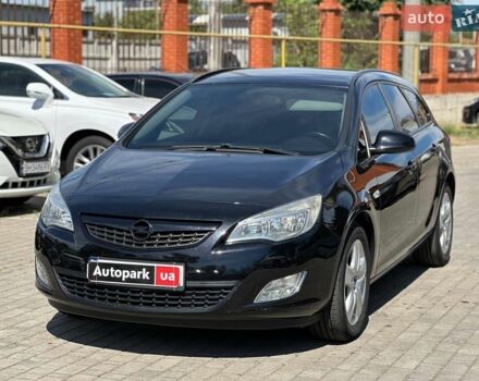 Чорний Опель Астра, об'ємом двигуна 2 л та пробігом 223 тис. км за 6490 $, фото 1 на Automoto.ua