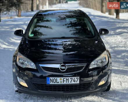 Черный Опель Астра, объемом двигателя 1.6 л и пробегом 230 тыс. км за 7300 $, фото 1 на Automoto.ua