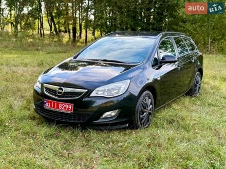 Черный Опель Астра, объемом двигателя 1.6 л и пробегом 177 тыс. км за 7700 $, фото 1 на Automoto.ua