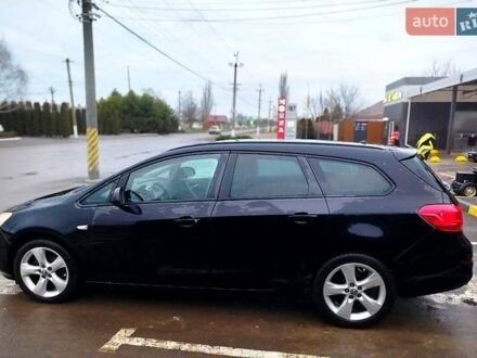 Черный Опель Астра, объемом двигателя 1.4 л и пробегом 307 тыс. км за 6500 $, фото 1 на Automoto.ua