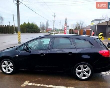 Черный Опель Астра, объемом двигателя 1.4 л и пробегом 307 тыс. км за 6500 $, фото 1 на Automoto.ua