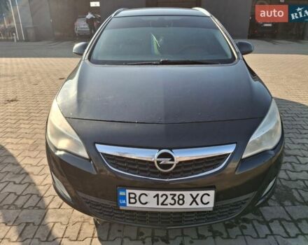 Черный Опель Астра, объемом двигателя 1.25 л и пробегом 296 тыс. км за 7000 $, фото 1 на Automoto.ua
