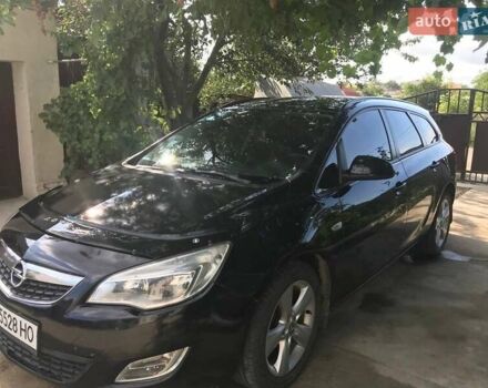 Черный Опель Астра, объемом двигателя 1.25 л и пробегом 255 тыс. км за 5300 $, фото 1 на Automoto.ua