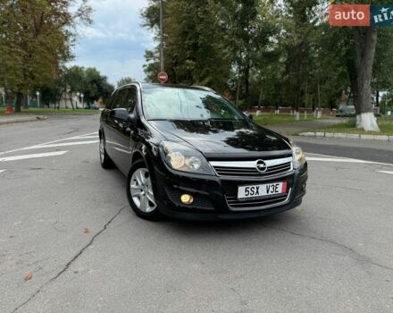 Черный Опель Астра, объемом двигателя 1.6 л и пробегом 170 тыс. км за 6399 $, фото 1 на Automoto.ua