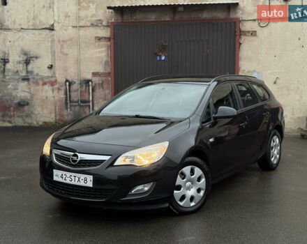 Черный Опель Астра, объемом двигателя 1.4 л и пробегом 225 тыс. км за 6350 $, фото 1 на Automoto.ua