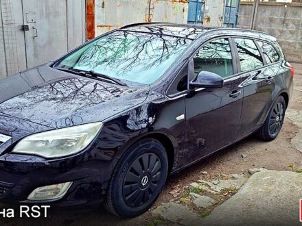 Черный Опель Астра, объемом двигателя 1.2 л и пробегом 230 тыс. км за 5500 $, фото 1 на Automoto.ua