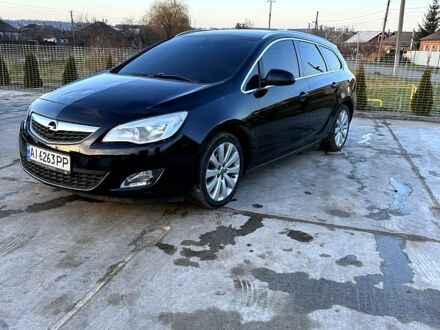Черный Опель Астра, объемом двигателя 1.2 л и пробегом 25 тыс. км за 5600 $, фото 1 на Automoto.ua