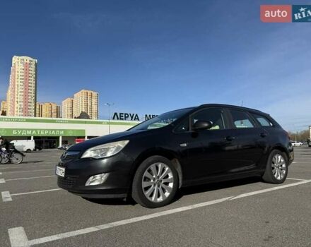 Черный Опель Астра, объемом двигателя 1.4 л и пробегом 192 тыс. км за 7000 $, фото 1 на Automoto.ua