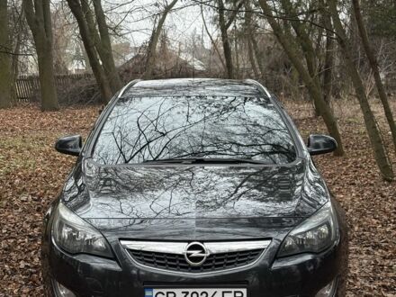 Черный Опель Астра, объемом двигателя 1.7 л и пробегом 195 тыс. км за 7800 $, фото 1 на Automoto.ua