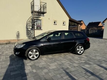 Черный Опель Астра, объемом двигателя 1.2 л и пробегом 300 тыс. км за 4950 $, фото 1 на Automoto.ua