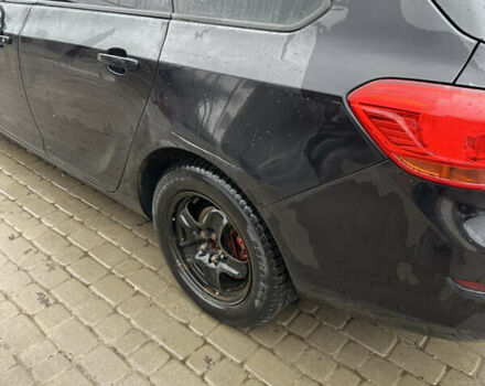 Черный Опель Астра, объемом двигателя 1.3 л и пробегом 264 тыс. км за 6500 $, фото 1 на Automoto.ua