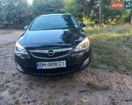 Черный Опель Астра, объемом двигателя 1.25 л и пробегом 232 тыс. км за 7200 $, фото 1 на Automoto.ua