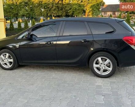 Черный Опель Астра, объемом двигателя 1.7 л и пробегом 250 тыс. км за 7900 $, фото 1 на Automoto.ua