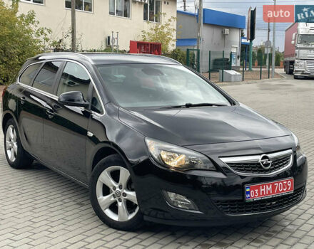 Черный Опель Астра, объемом двигателя 1.6 л и пробегом 125 тыс. км за 7450 $, фото 1 на Automoto.ua