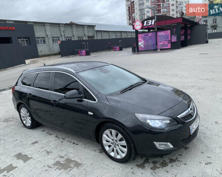 Черный Опель Астра, объемом двигателя 1.7 л и пробегом 264 тыс. км за 7600 $, фото 1 на Automoto.ua