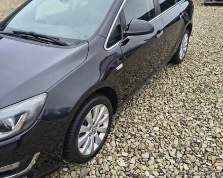 Черный Опель Астра, объемом двигателя 2 л и пробегом 175 тыс. км за 8300 $, фото 1 на Automoto.ua