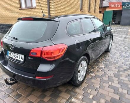 Черный Опель Астра, объемом двигателя 1.7 л и пробегом 185 тыс. км за 6650 $, фото 1 на Automoto.ua