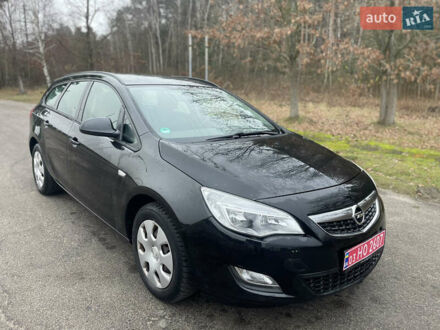 Черный Опель Астра, объемом двигателя 1.4 л и пробегом 210 тыс. км за 5900 $, фото 1 на Automoto.ua