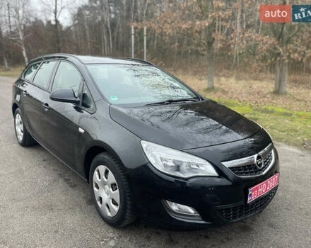 Черный Опель Астра, объемом двигателя 1.4 л и пробегом 210 тыс. км за 5900 $, фото 1 на Automoto.ua