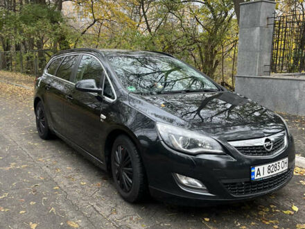 Черный Опель Астра, объемом двигателя 1.7 л и пробегом 275 тыс. км за 7400 $, фото 1 на Automoto.ua
