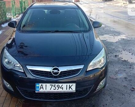Черный Опель Астра, объемом двигателя 1.7 л и пробегом 293 тыс. км за 6100 $, фото 1 на Automoto.ua