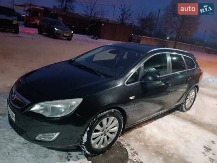 Черный Опель Астра, объемом двигателя 1.3 л и пробегом 260 тыс. км за 6800 $, фото 1 на Automoto.ua