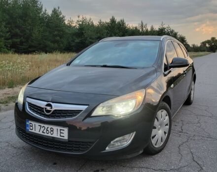 Черный Опель Астра, объемом двигателя 1.2 л и пробегом 180 тыс. км за 7200 $, фото 1 на Automoto.ua
