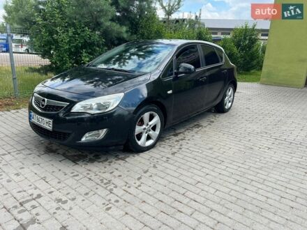 Черный Опель Астра, объемом двигателя 1.25 л и пробегом 300 тыс. км за 5500 $, фото 1 на Automoto.ua