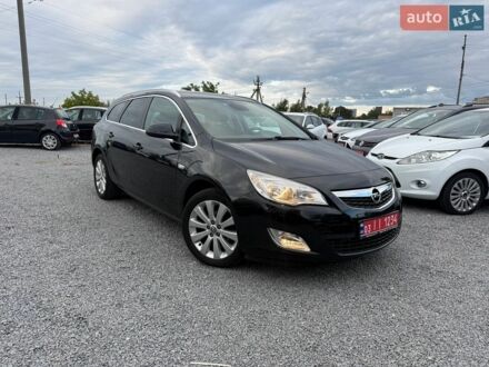 Черный Опель Астра, объемом двигателя 1.4 л и пробегом 220 тыс. км за 7800 $, фото 1 на Automoto.ua