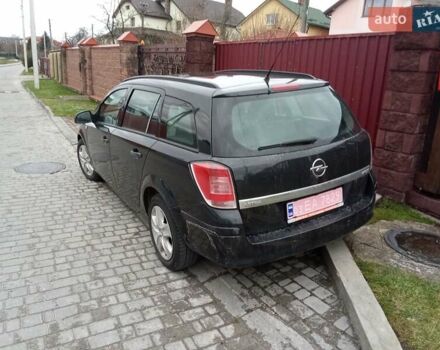 Черный Опель Астра, объемом двигателя 1.69 л и пробегом 260 тыс. км за 5600 $, фото 1 на Automoto.ua