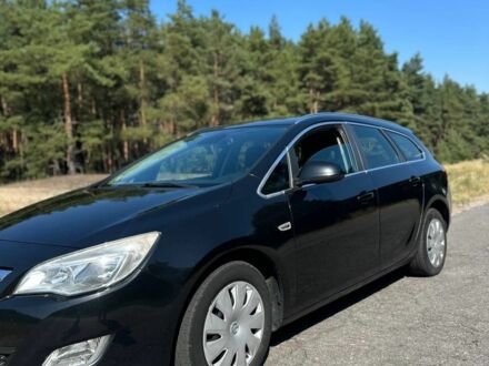 Черный Опель Астра, объемом двигателя 1.2 л и пробегом 171 тыс. км за 7350 $, фото 1 на Automoto.ua