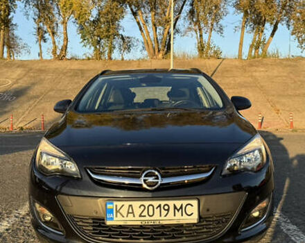 Черный Опель Астра, объемом двигателя 1.4 л и пробегом 211 тыс. км за 7500 $, фото 1 на Automoto.ua