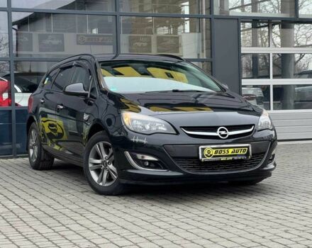 Черный Опель Астра, объемом двигателя 1.6 л и пробегом 145 тыс. км за 9600 $, фото 1 на Automoto.ua