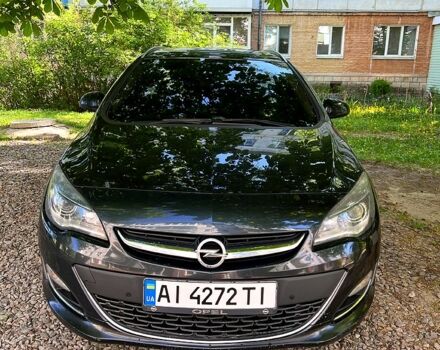 Черный Опель Астра, объемом двигателя 1.6 л и пробегом 290 тыс. км за 8250 $, фото 1 на Automoto.ua