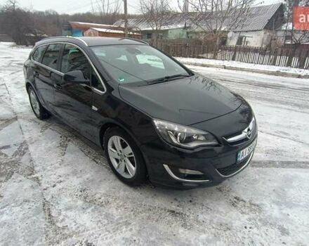 Черный Опель Астра, объемом двигателя 1.6 л и пробегом 239 тыс. км за 9600 $, фото 1 на Automoto.ua
