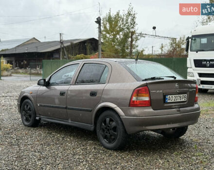 Коричневый Опель Астра, объемом двигателя 2 л и пробегом 240 тыс. км за 2500 $, фото 4 на Automoto.ua
